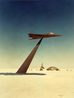 Model Lockheed F-117 Nighthawk fighter wooden model on radar profile testing in the desert.